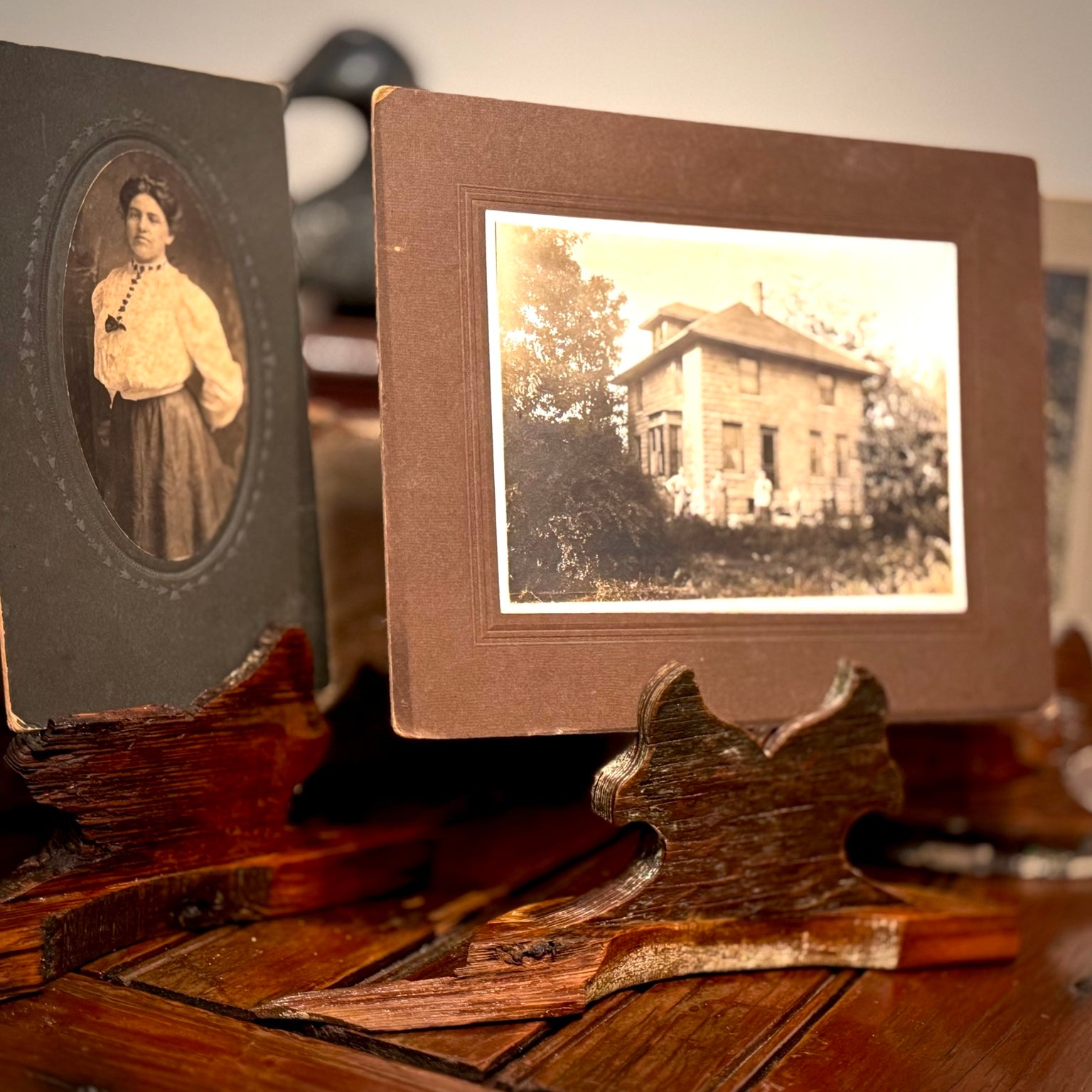 Found antique photographs paired with handmade reclaimed heart pine holders